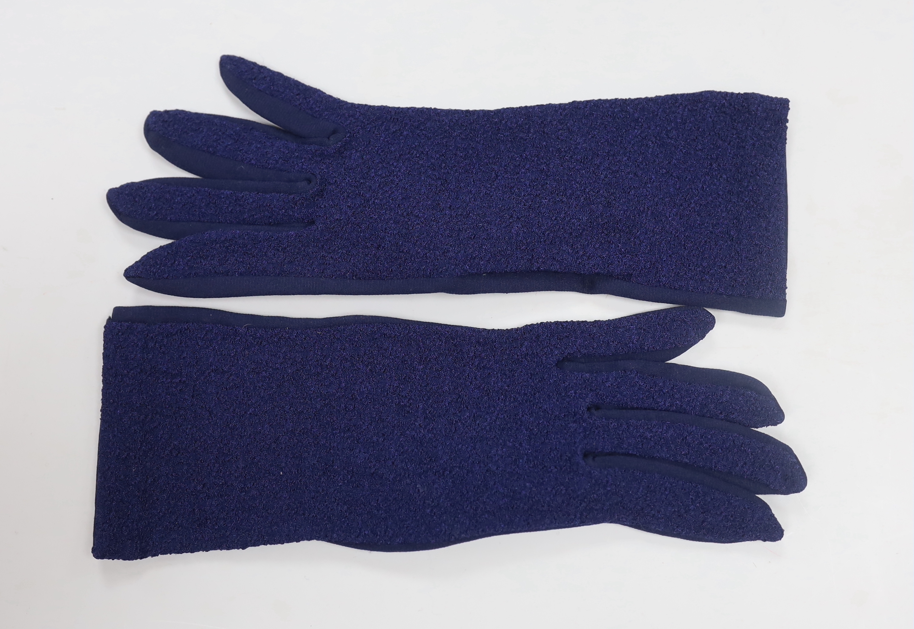 An evening purse, a shawl and pair of blue gloves